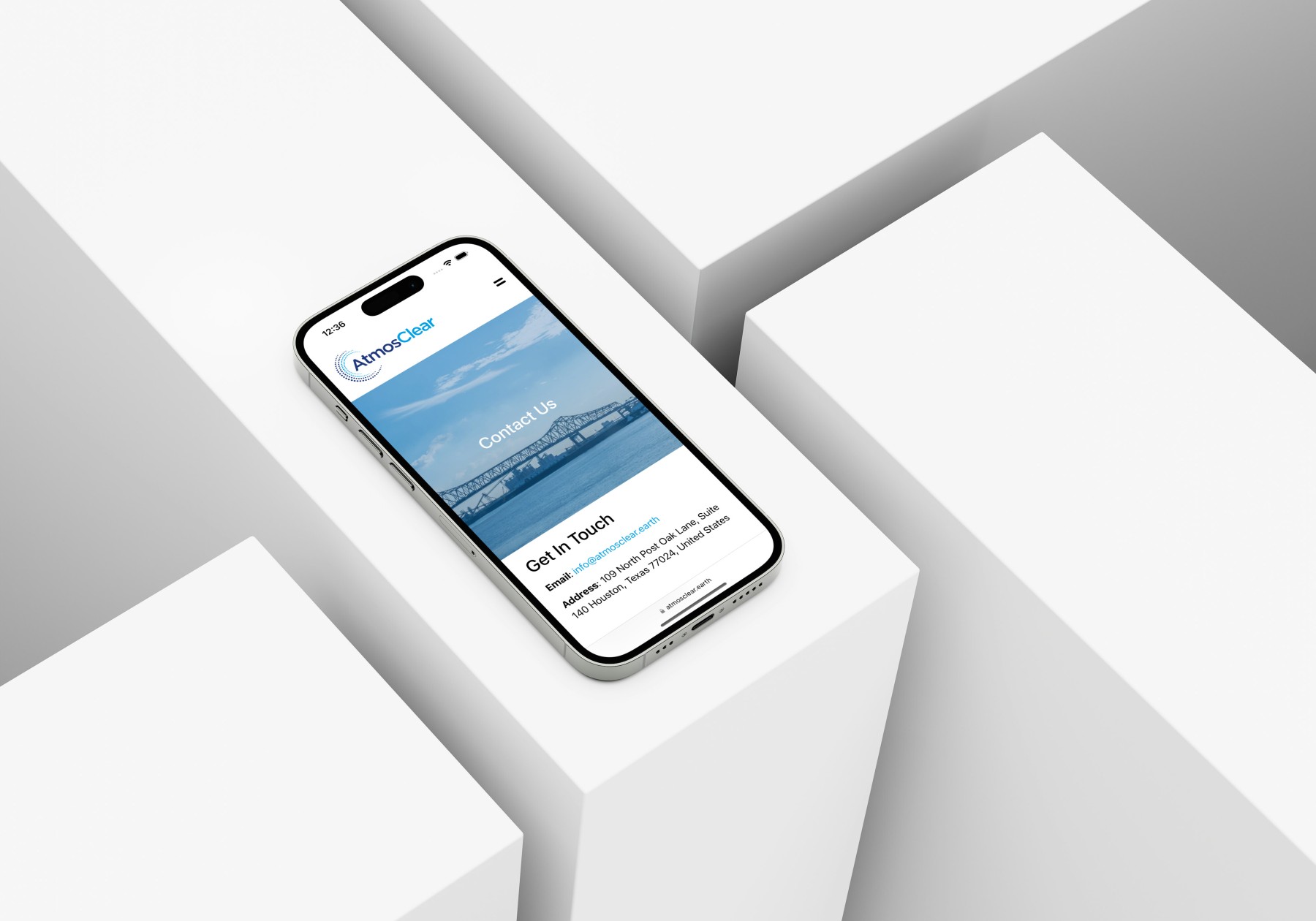 Atmos Clear website design mockup on an iPhone